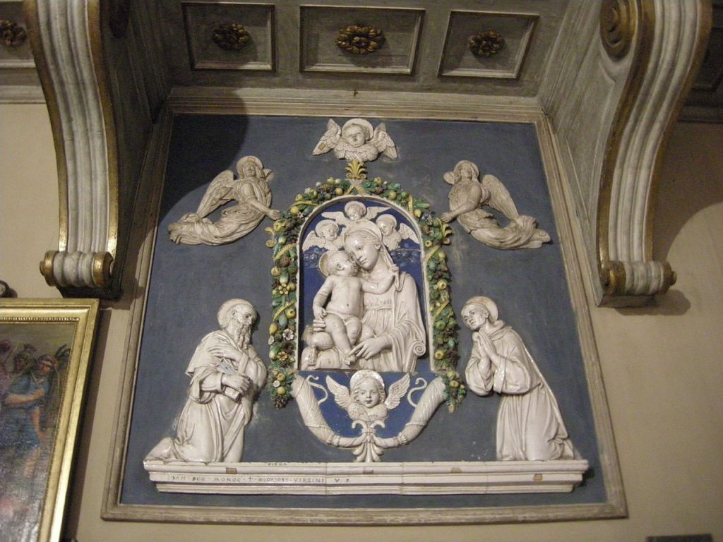 La Madonna con il Bambino e i santi Bartolomeo e Bernardo, in origine due opere distinte 